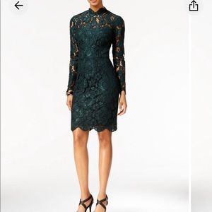 Verdant floral green lace traces. Betsey Johnson dress.
Hidden back zipper
